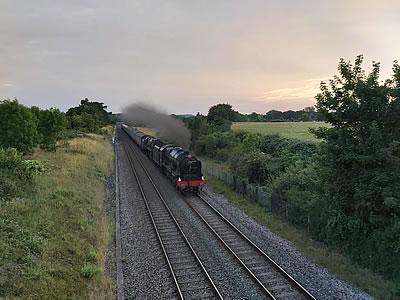 Photo Gallery Image - Stream train on the main line through the parish